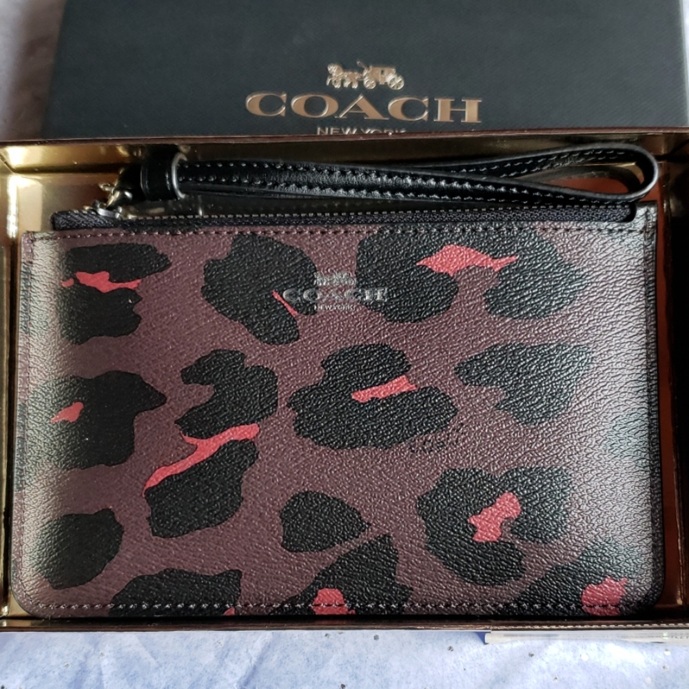 Coach Leopard print. Medium size Wristlet. New